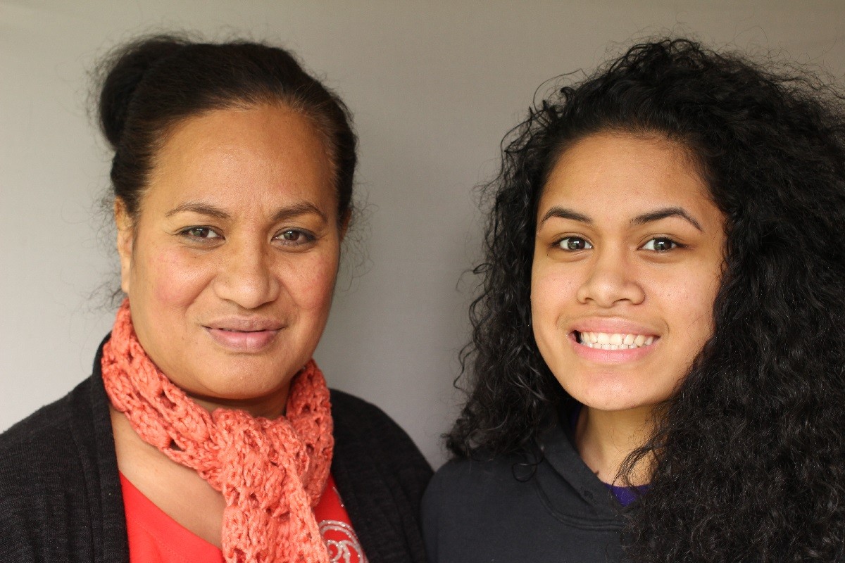 High school student Lika (right) told teacher Lynette Finau what it's like to attend school while living in a shelter in a StoryCorps "Finding Our Way" conversation. Image credit: StoryCorps